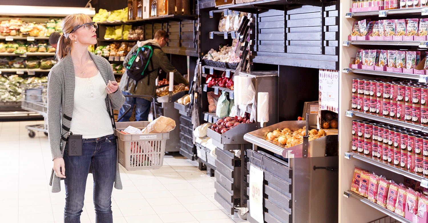 Woman looking at packaging in a store