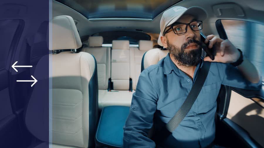 Man talking on a mobile while driving